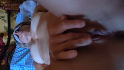 She caresses herself blindfolded and I film her.