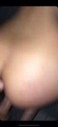 A finger up her ass doggy-style