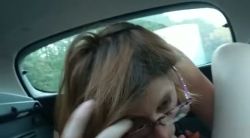 In the driving school she gives the instructor a blowjob
