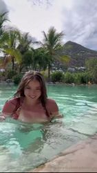 I strip bare fingering my shaved pussy poolside