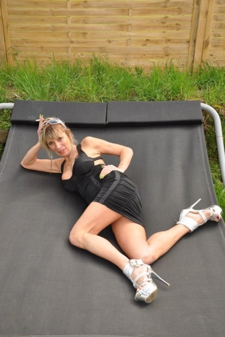 Mature blonde prend un jeune comme attraction n°9